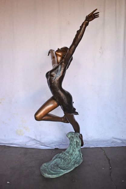 Ballet Dancer Performing on Stage Bronze Statue - Size: 45"L x 27"W x 71"H.