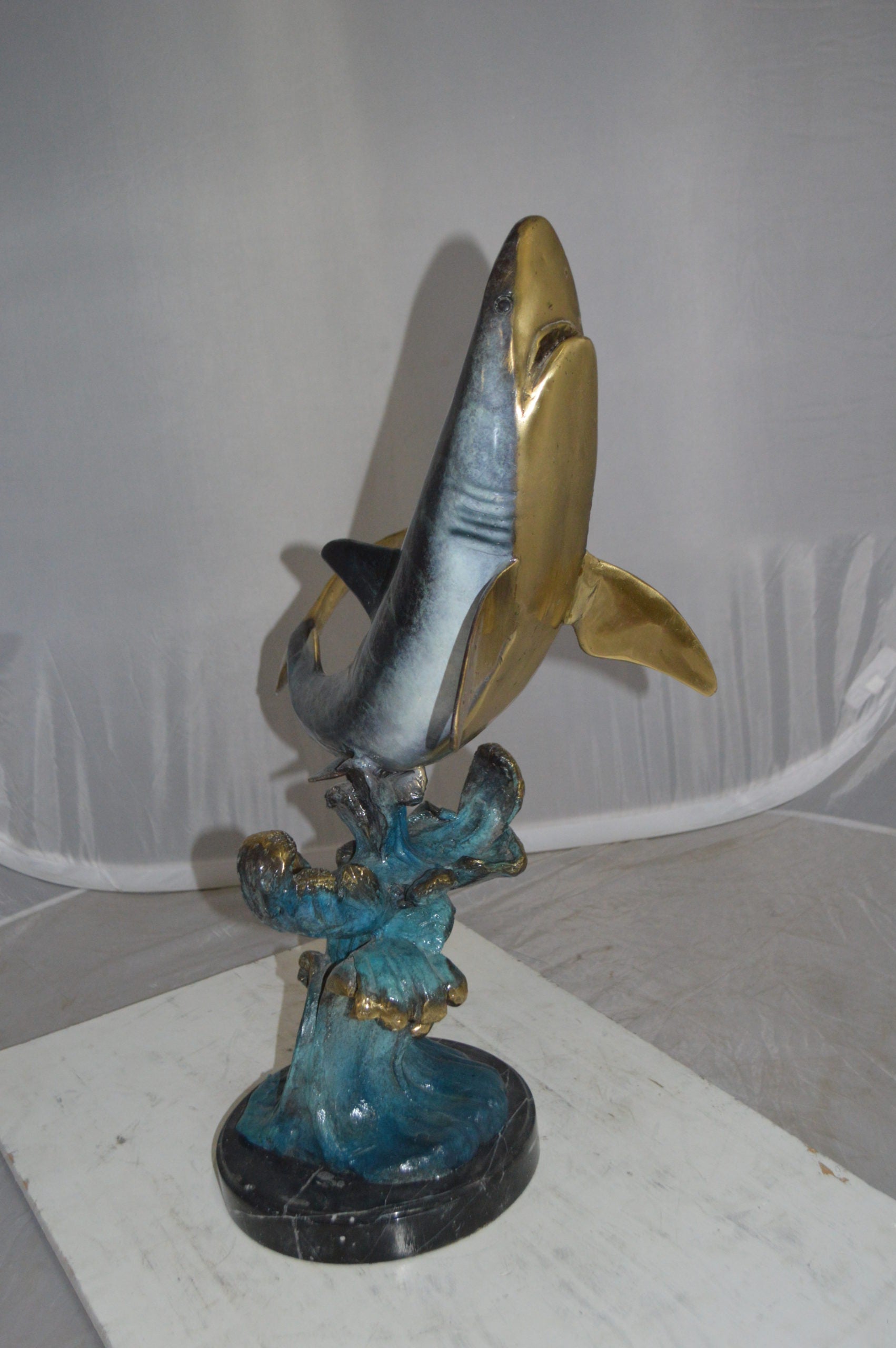 Shark Jumping off the water Bronze Statue -  Size: 14"L x 24"W x 28"H. 