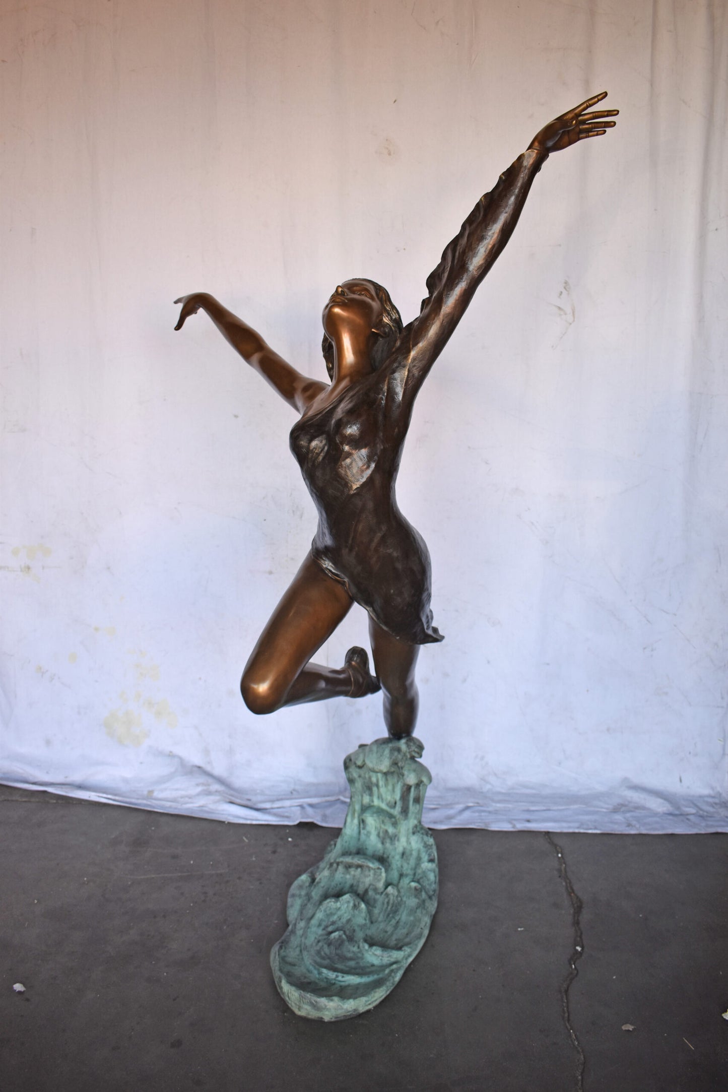Ballet Dancer Performing on Stage Bronze Statue - Size: 45"L x 27"W x 71"H.