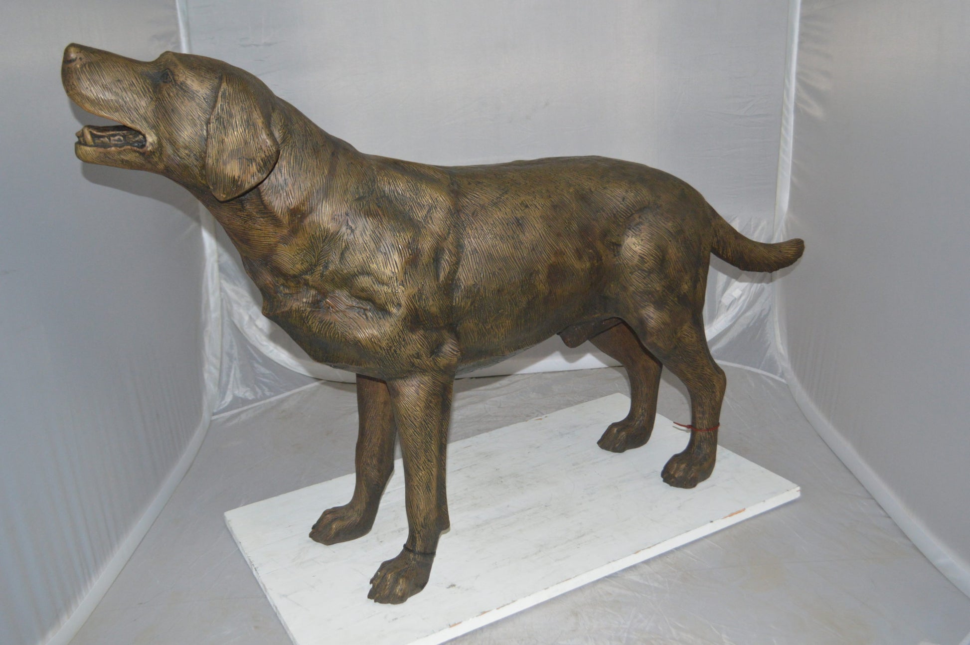Labrador Retriever Bronze Statue -  Size: 12"L x 50"W x 31"H. 