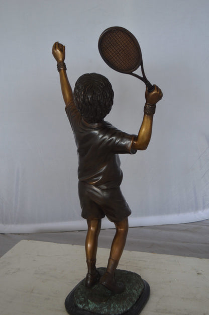 Boy Playing Tennis Bronze Statue -  Size: 12"L x 8"W x 25"H. 