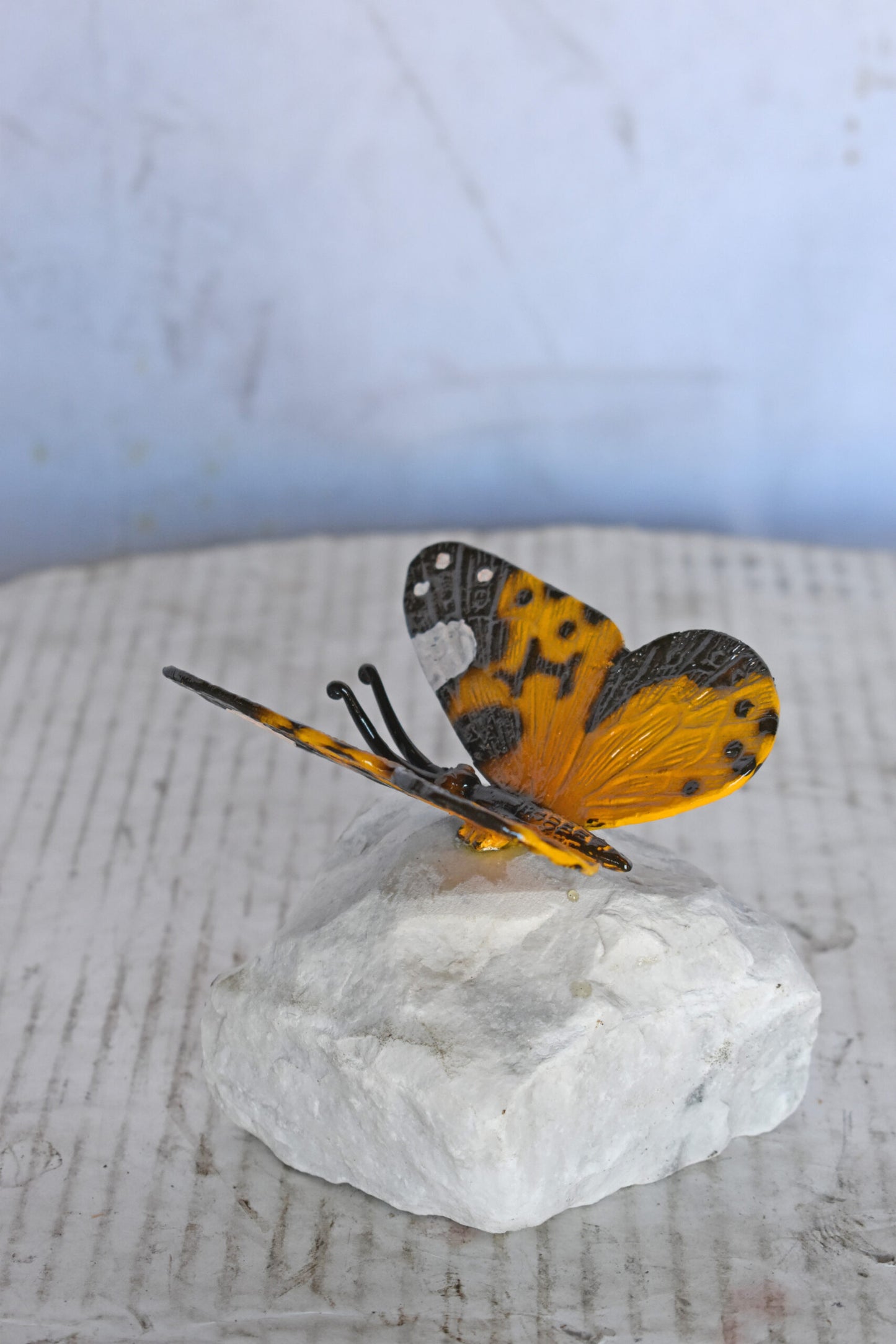 Orange Butterfly made of Bronze mounted on a rock - Size: 5"L x 5"W x 4"H.