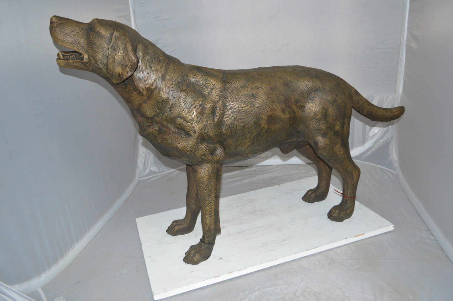 Labrador Retriever Bronze Statue -  Size: 12"L x 50"W x 31"H. 