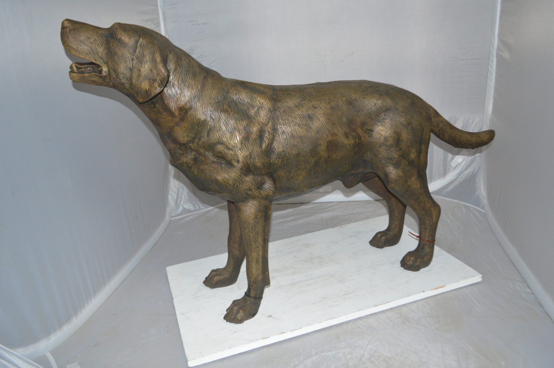 Labrador Retriever Bronze Statue -  Size: 12"L x 50"W x 31"H. 