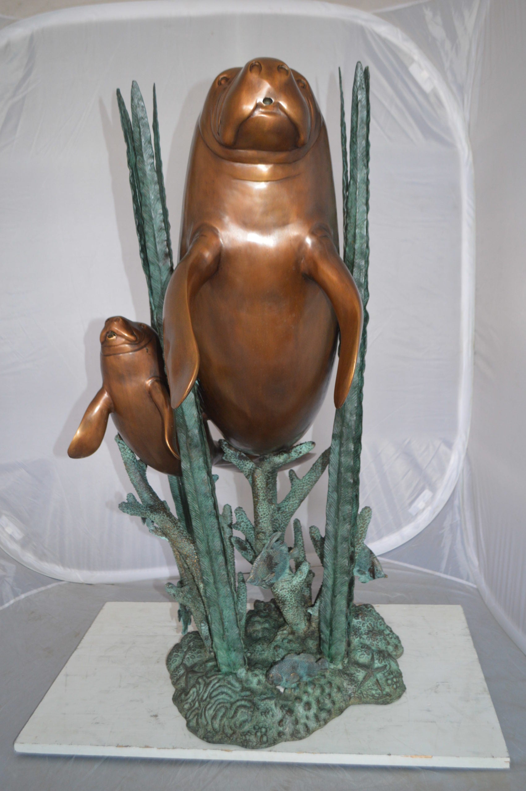 Two Large Manatees swimming Bronze Fountain Statue -  Size: 23"L x 42"W x 42"H. 