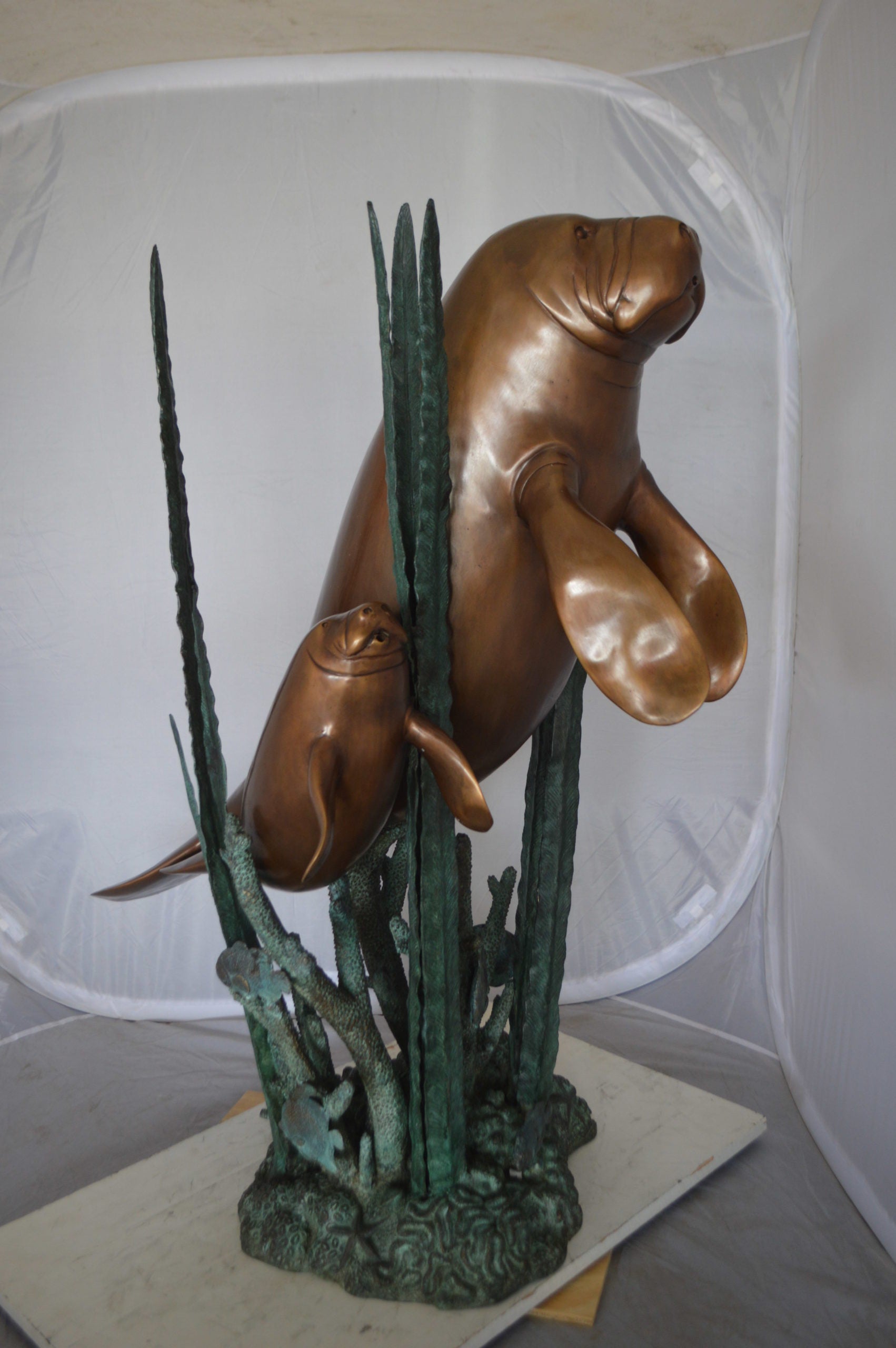 Two Large Manatees swimming Bronze Fountain Statue -  Size: 23"L x 42"W x 42"H. 
