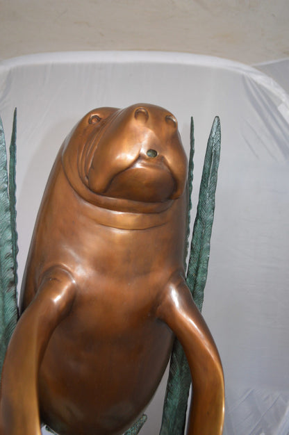 Two Large Manatees swimming Bronze Fountain Statue -  Size: 23"L x 42"W x 42"H. 