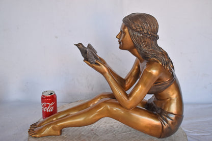 Young Beautiful Girl Helping A Bird Fly - Size: 22"L x 7"W x 18"H.