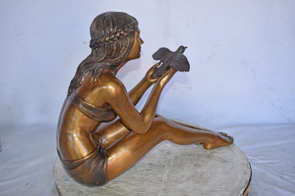 Young Beautiful Girl Helping A Bird Fly - Size: 22"L x 7"W x 18"H.