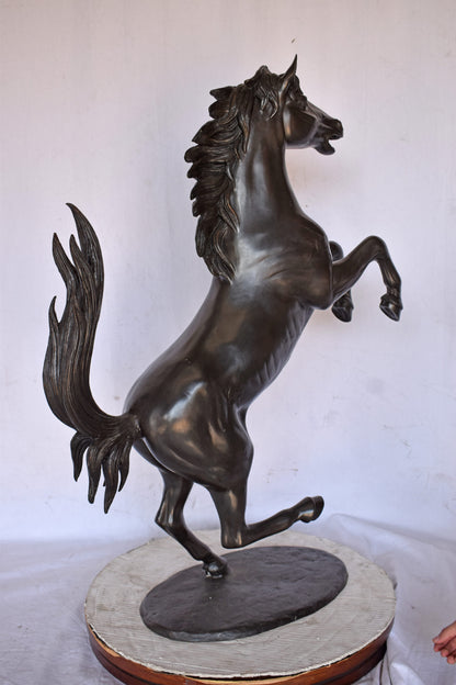 Ferrari Horse Bronze Statue Medium - Size: 28"L x 11"W x 40"H.