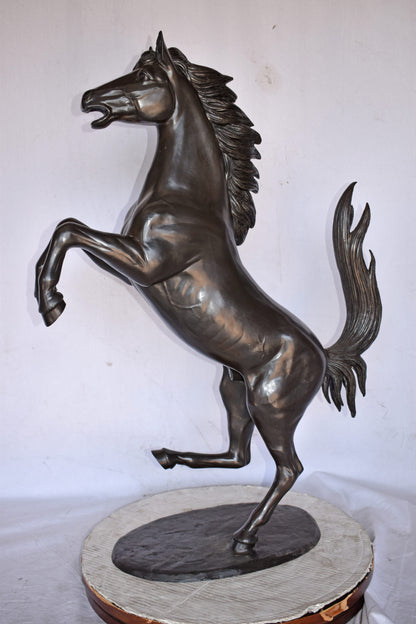 Ferrari Horse Bronze Statue Medium - Size: 28"L x 11"W x 40"H.