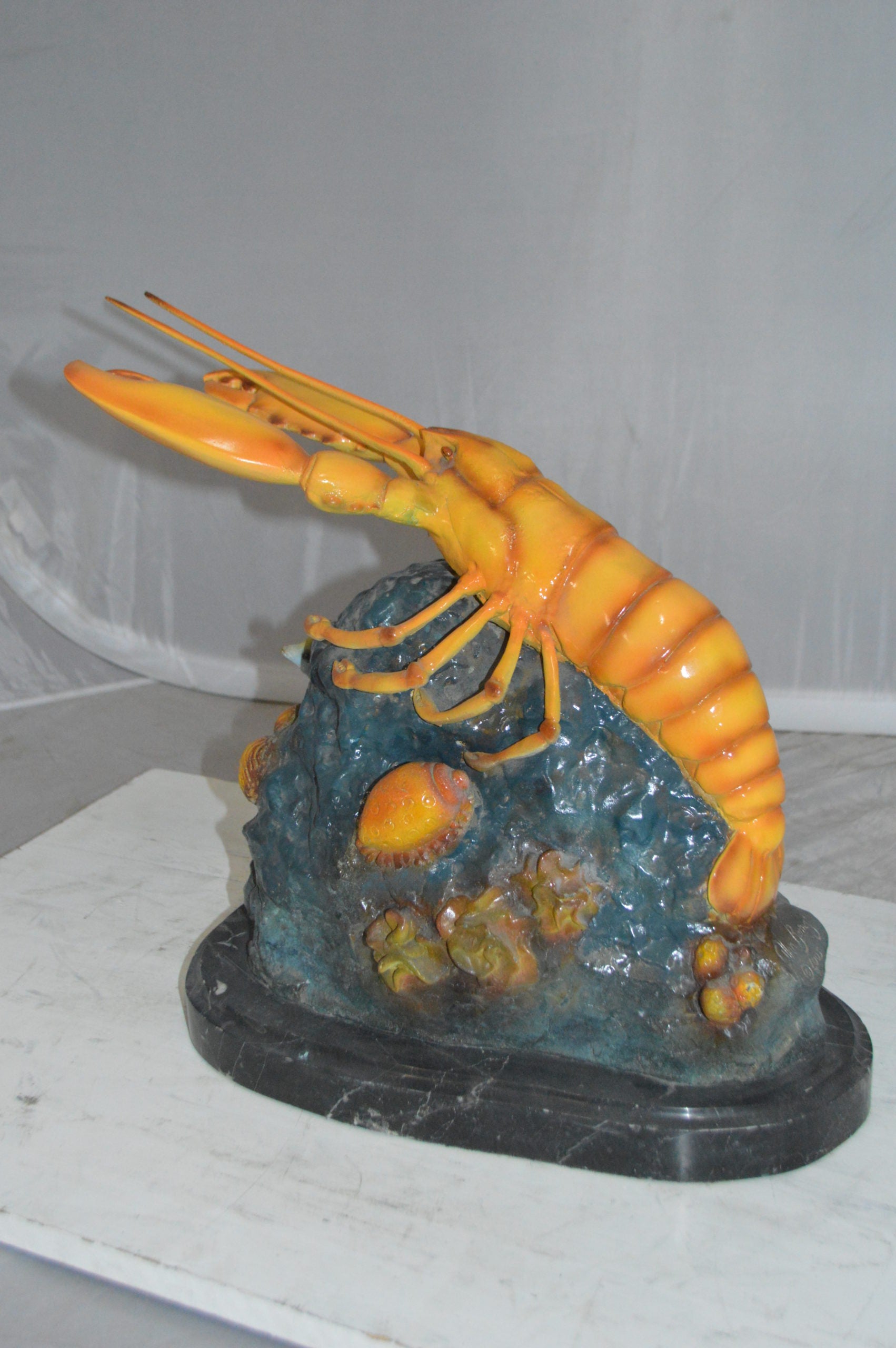Lobster with Fish Bronze Statue -  Size: 9"L x 18"W x 16"H. 