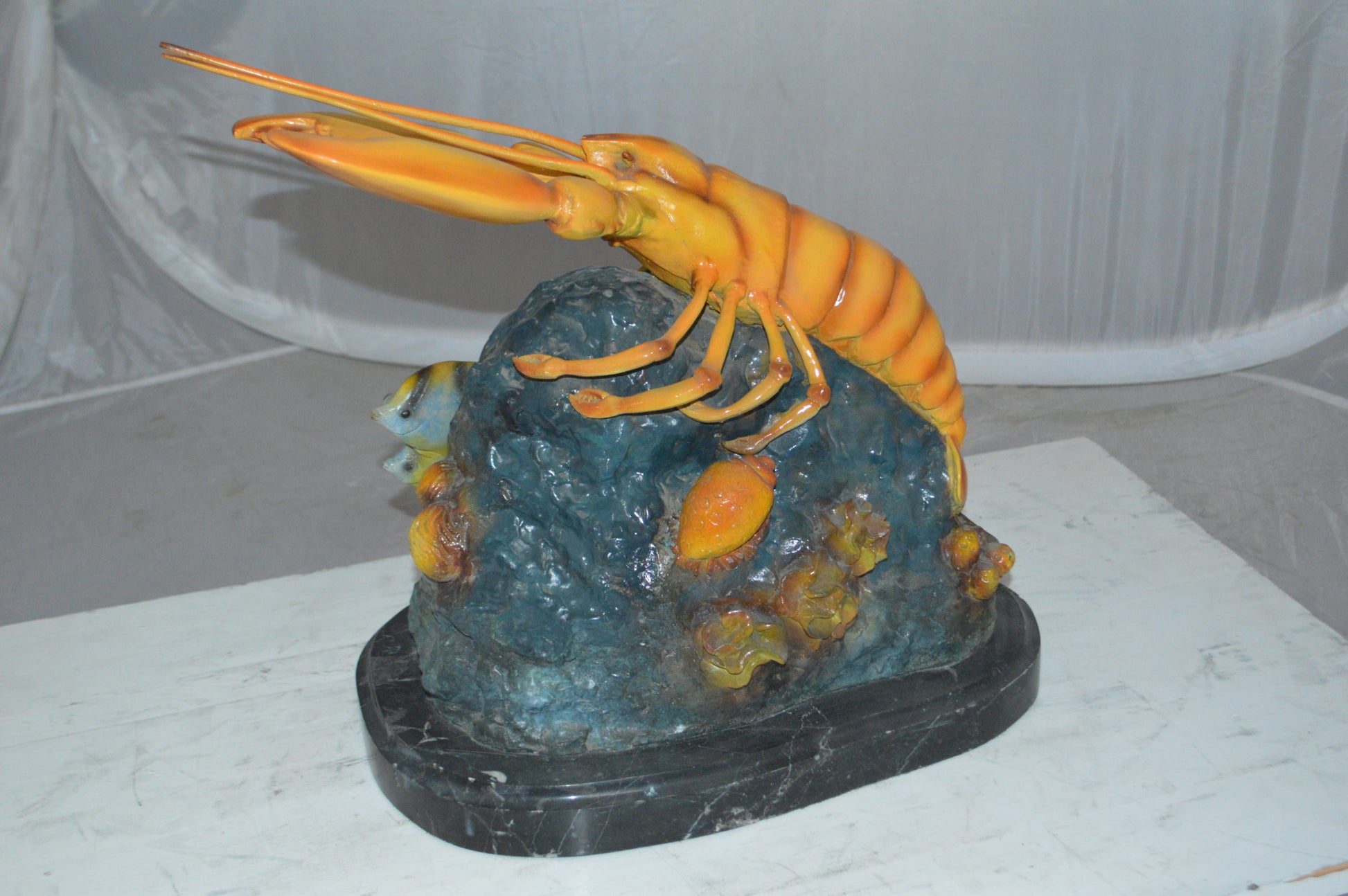 Lobster with Fish Bronze Statue -  Size: 9"L x 18"W x 16"H. 
