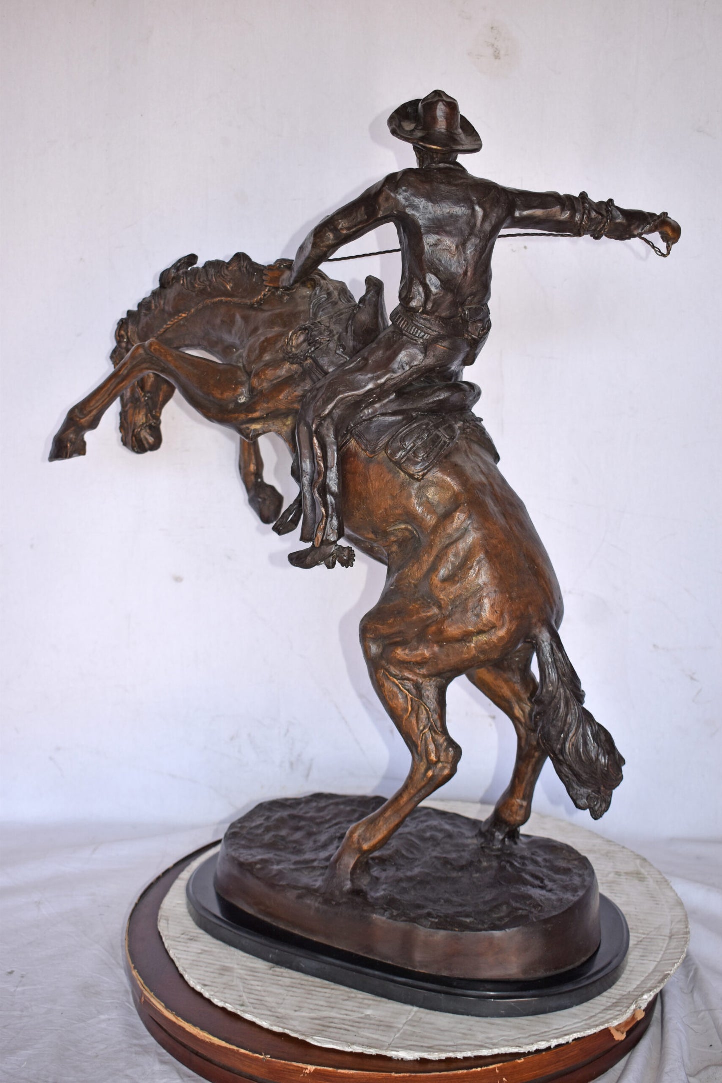 Bronco Buster by Remington Replica Bronze Statue - Size: 31"L x 17"W x 36"H.