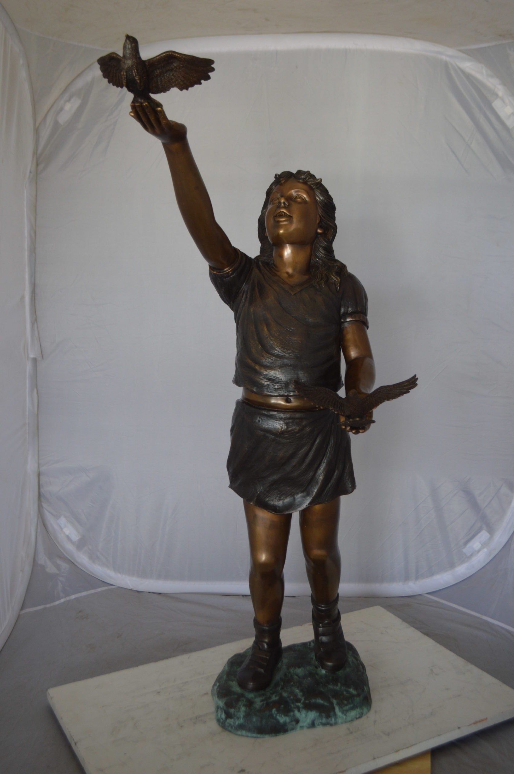 Girl - sandy, with two birds Bronze Statue -  Size: 25"L x 20"W x 42"H. 