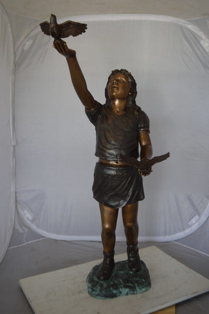 Girl - sandy, with two birds Bronze Statue -  Size: 25"L x 20"W x 42"H. 