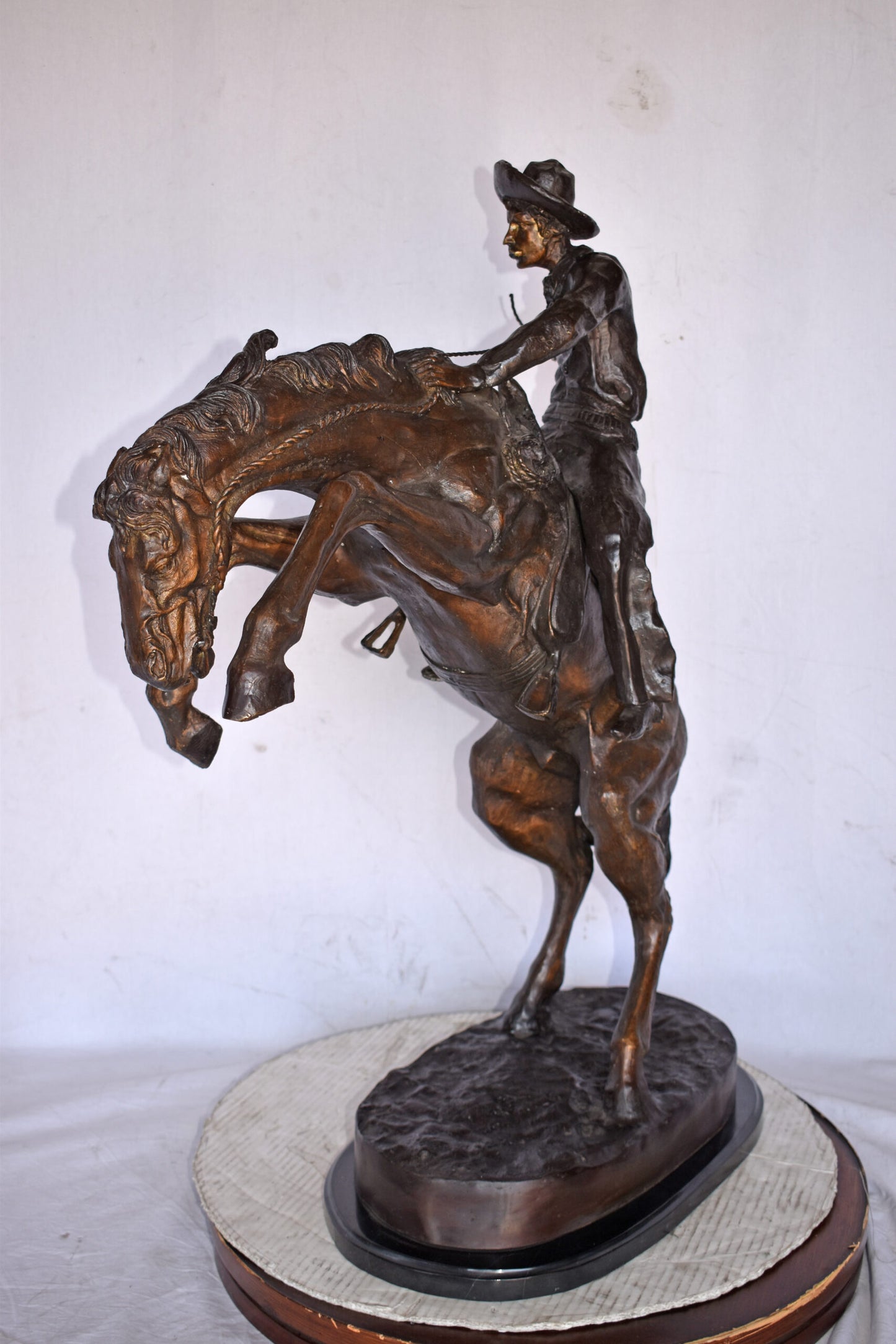 Bronco Buster by Remington Replica Bronze Statue - Size: 31"L x 17"W x 36"H.