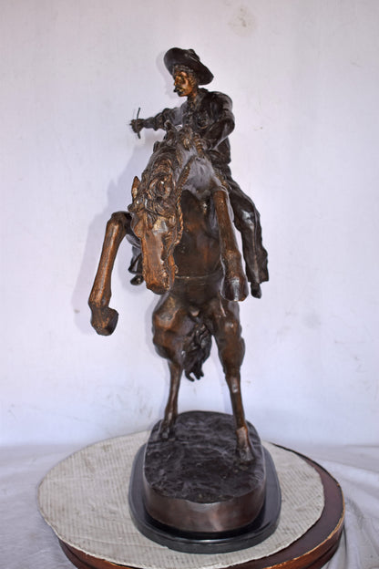 Bronco Buster by Remington Replica Bronze Statue - Size: 31"L x 17"W x 36"H.