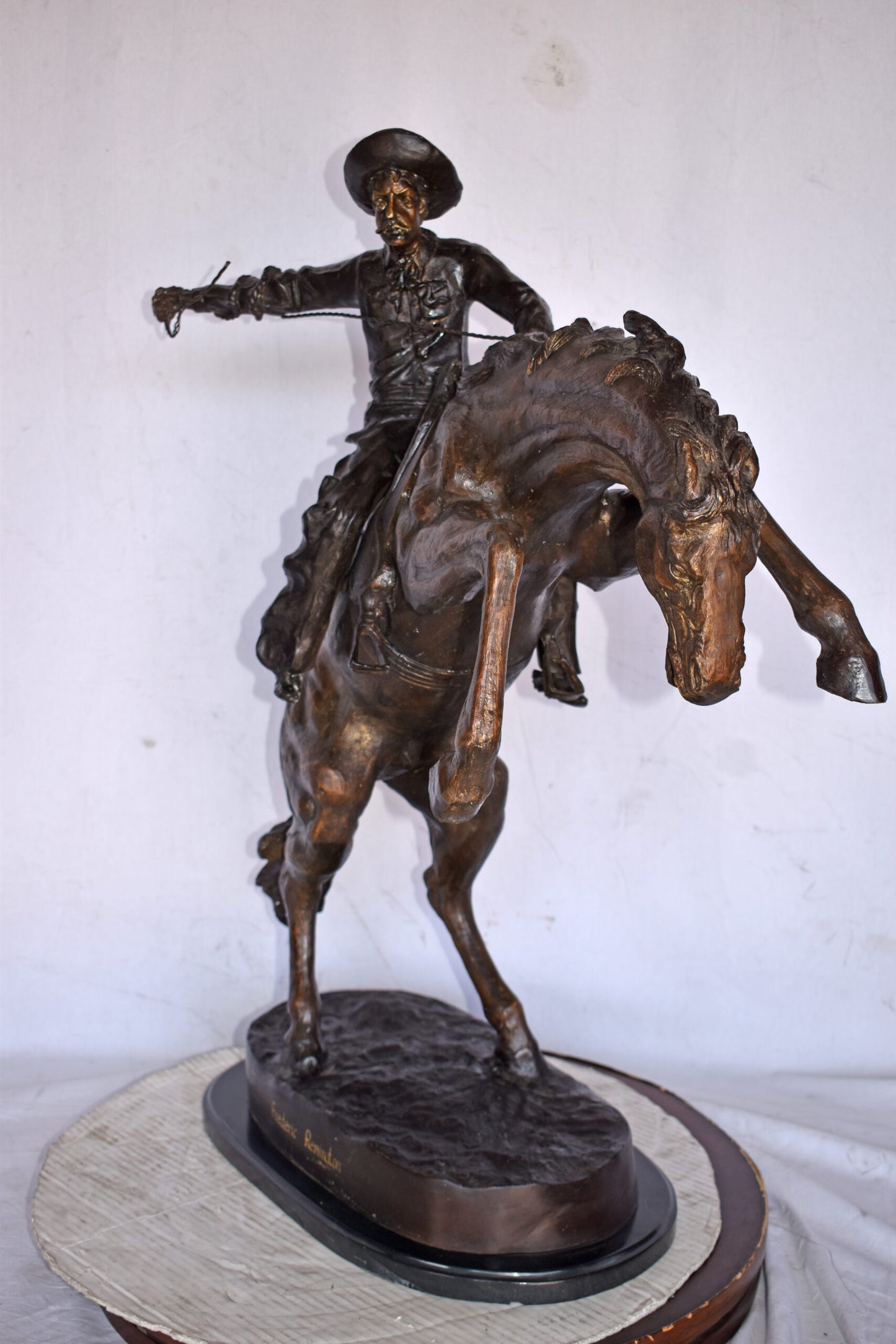 Bronco Buster by Remington Replica Bronze Statue - Size: 31"L x 17"W x 36"H.