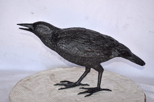 Raven Watching Forward Bronze State - Size: 22"L x 5"W x 7"H.