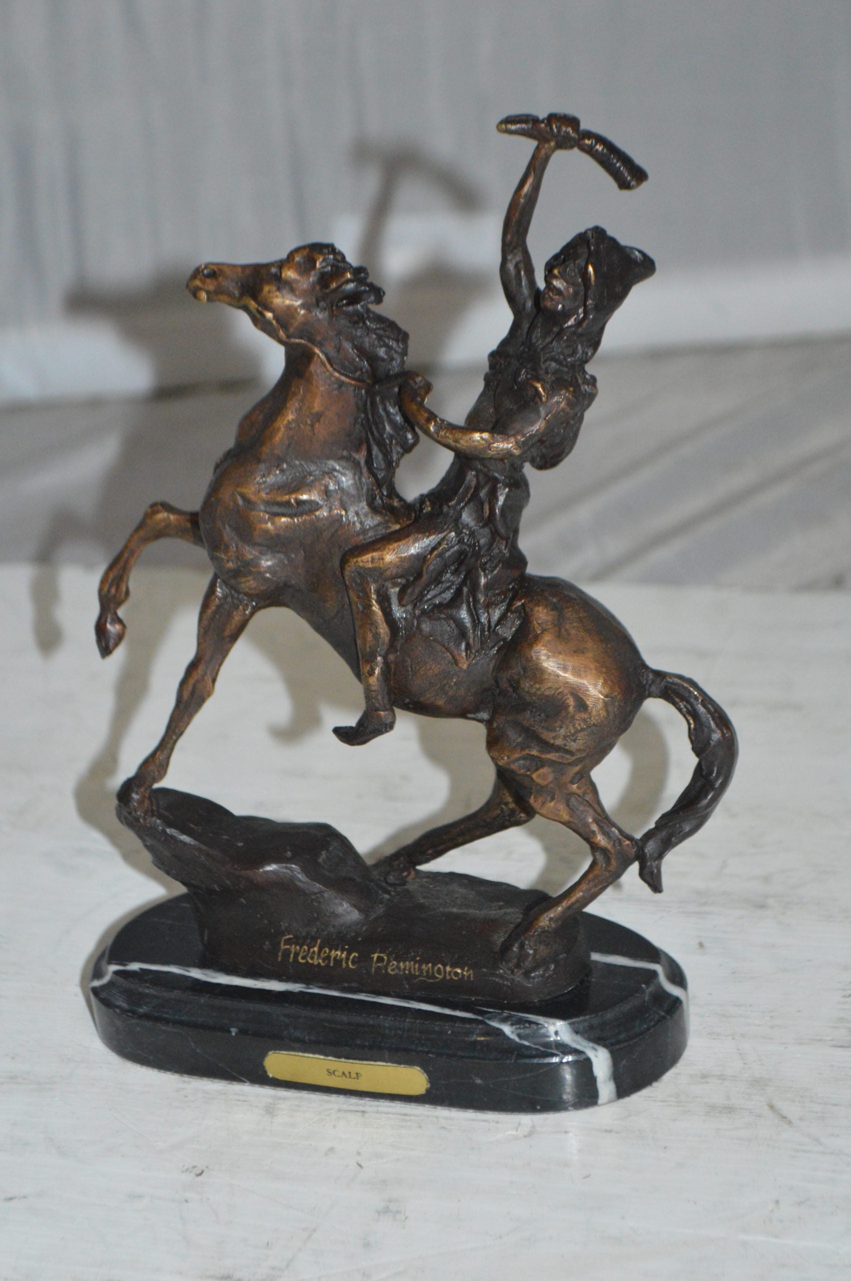 Scalp By Remington Bronze Statue -  Size: 3"L x 7"W x 10"H. 