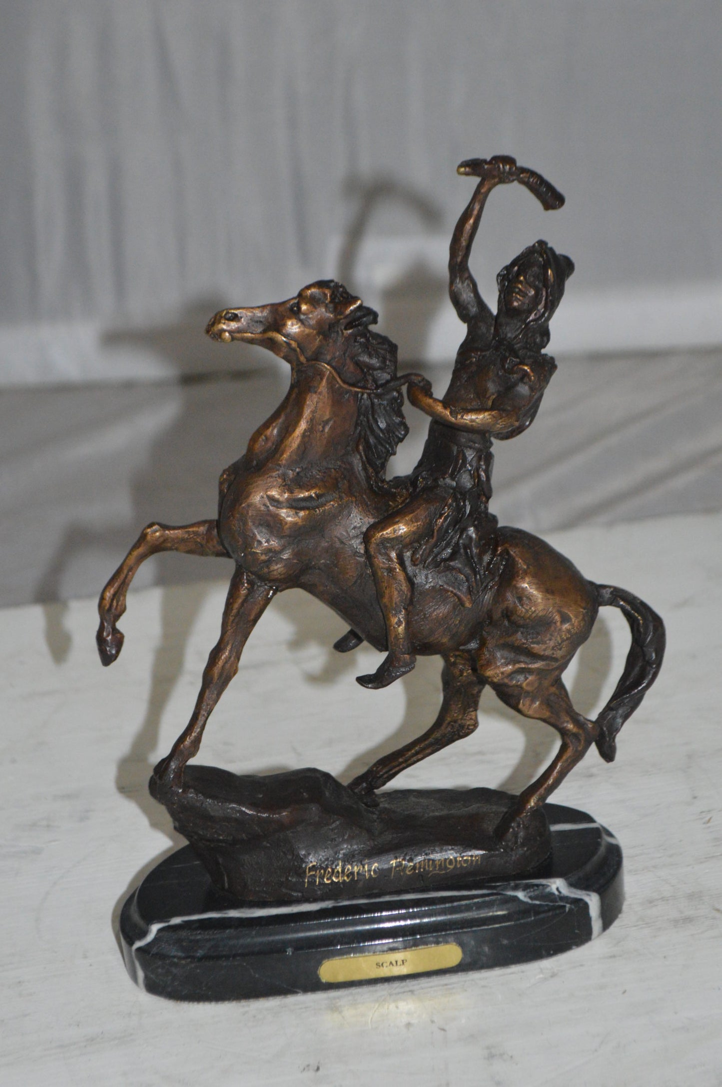 Scalp By Remington Bronze Statue -  Size: 3"L x 7"W x 10"H. 