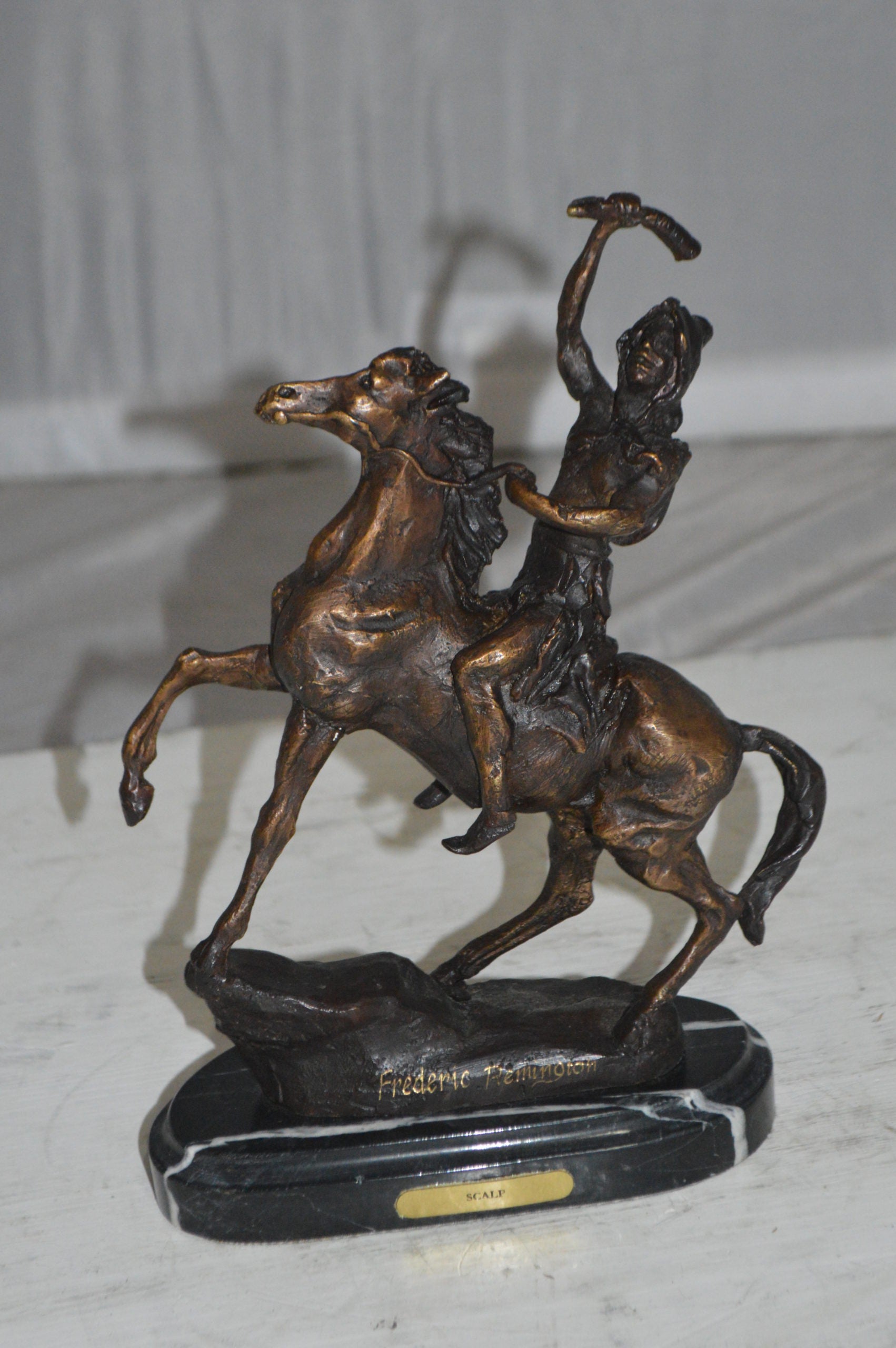 Scalp By Remington Bronze Statue -  Size: 3"L x 7"W x 10"H. 