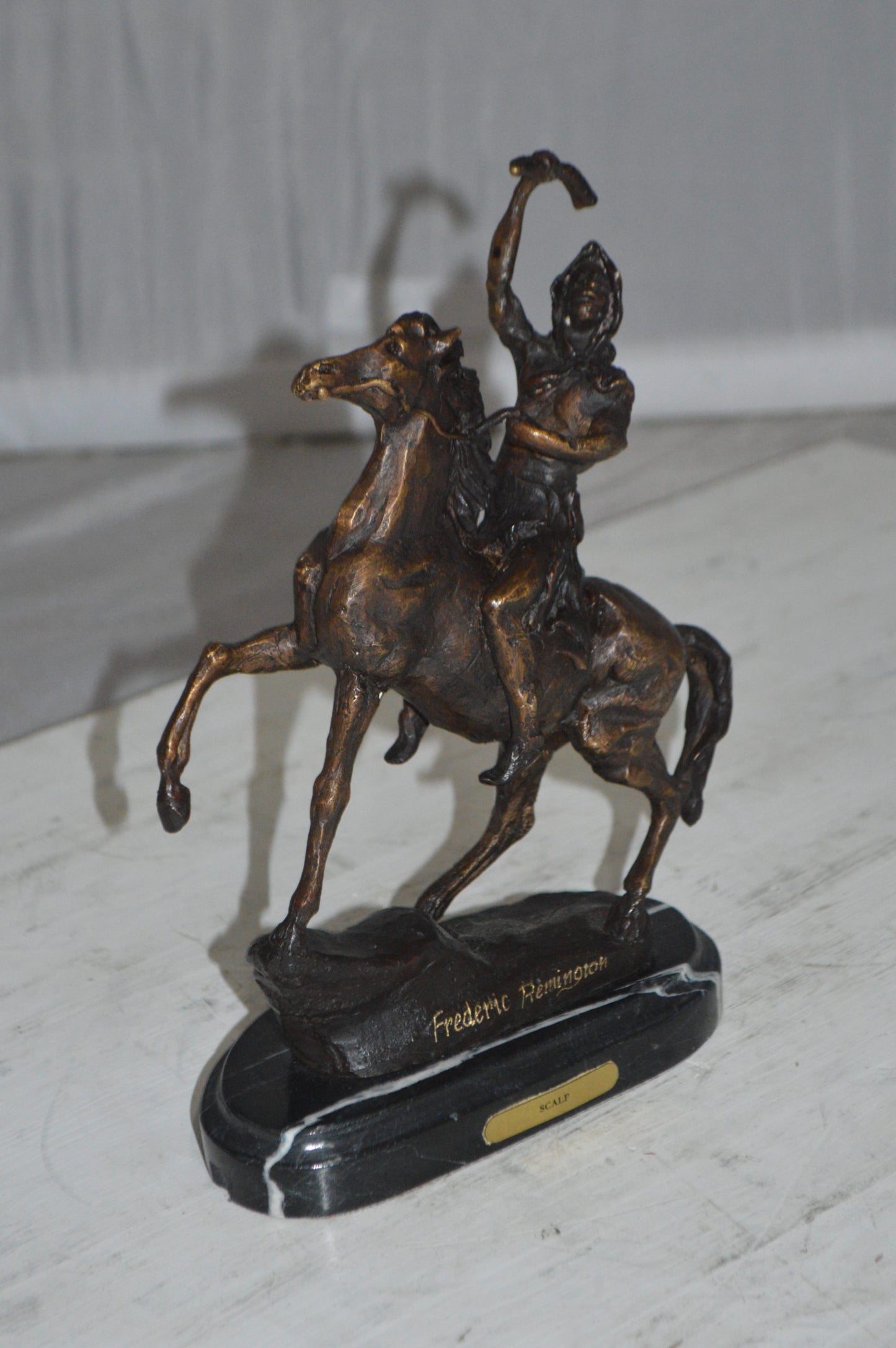 Scalp By Remington Bronze Statue -  Size: 3"L x 7"W x 10"H. 