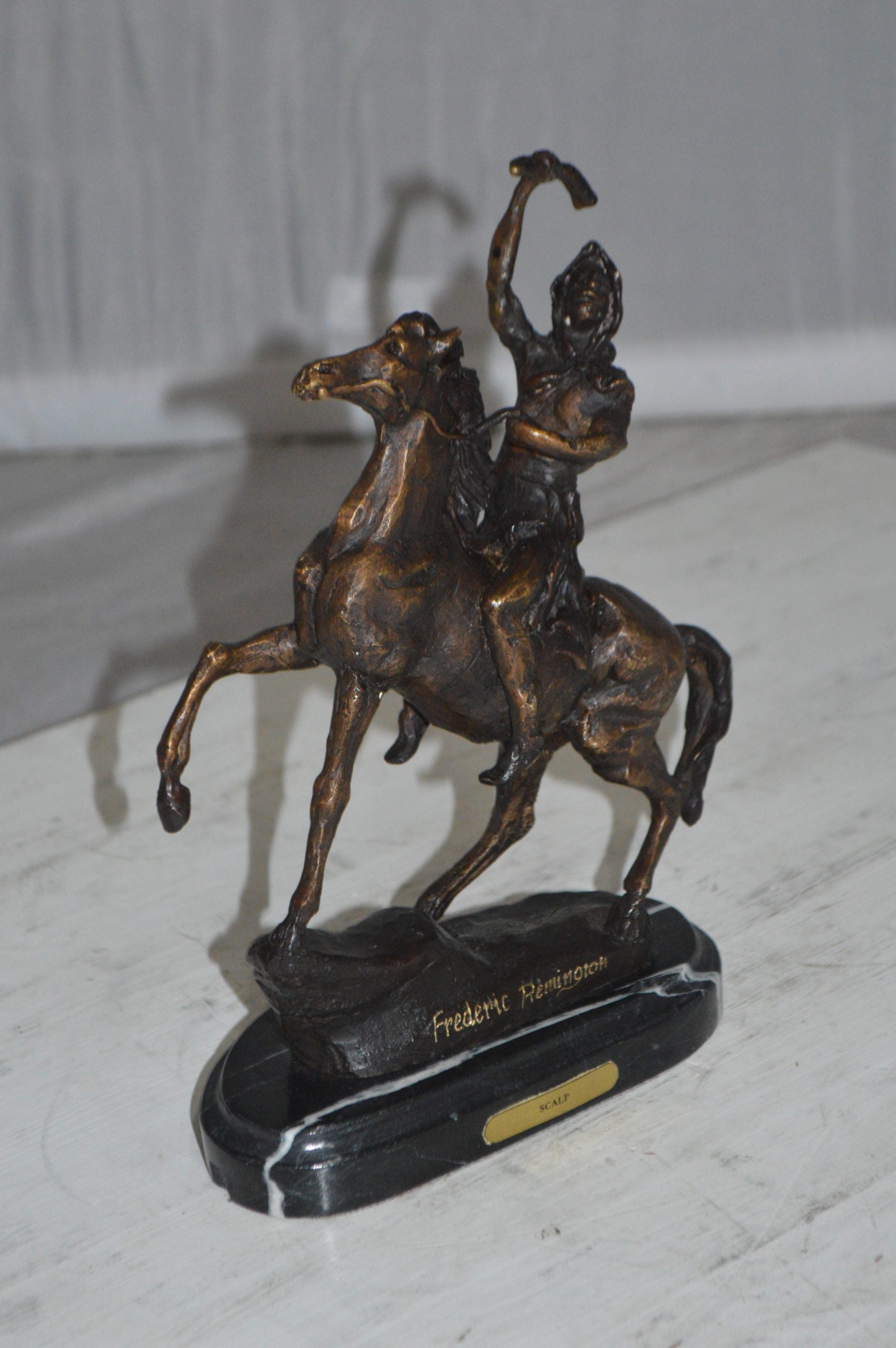 Scalp By Remington Bronze Statue -  Size: 3"L x 7"W x 10"H. 