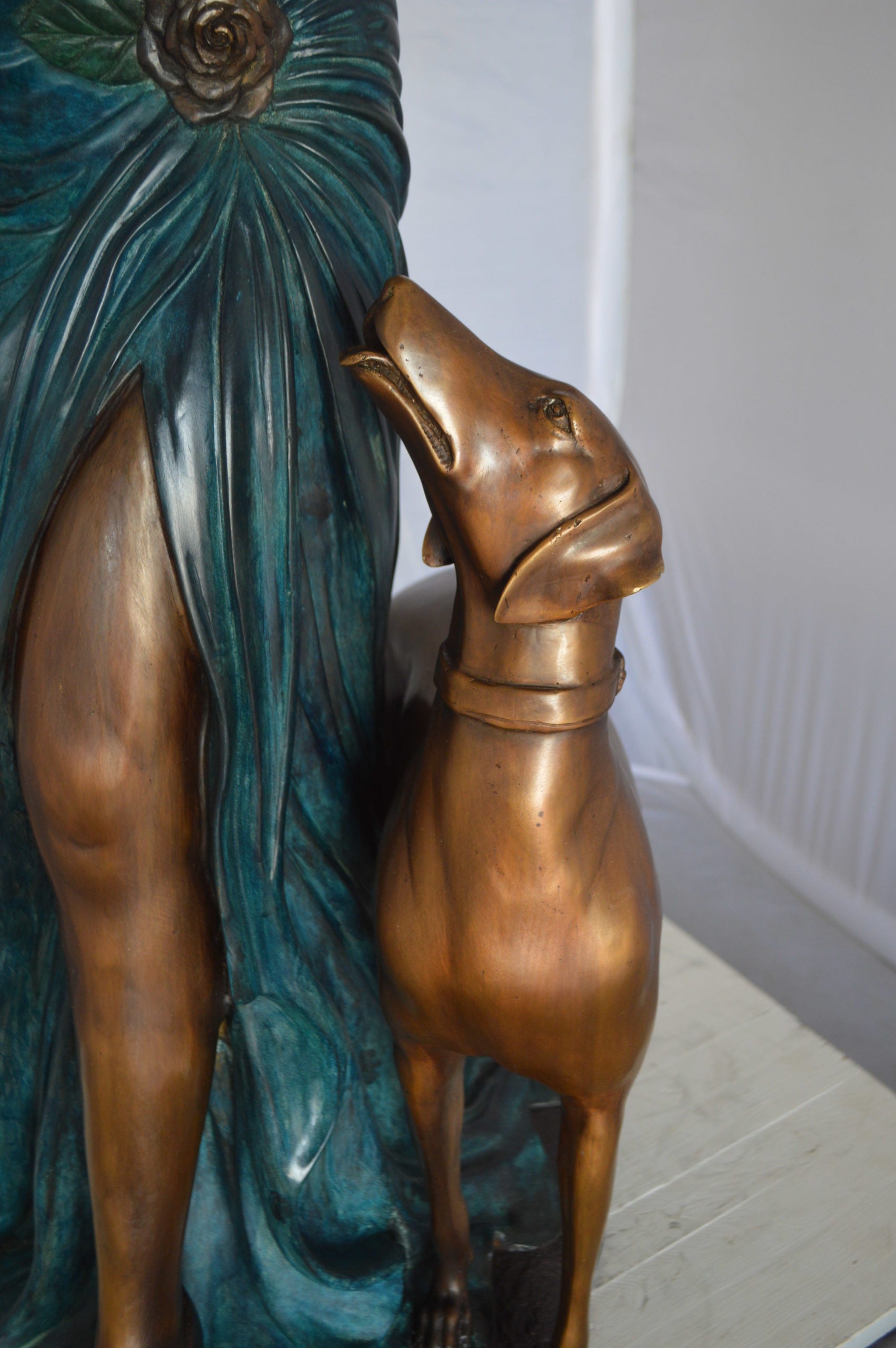 Lady With Her Dog Bronze Statue -  Size: 25"L x 22"W x 50"H. 