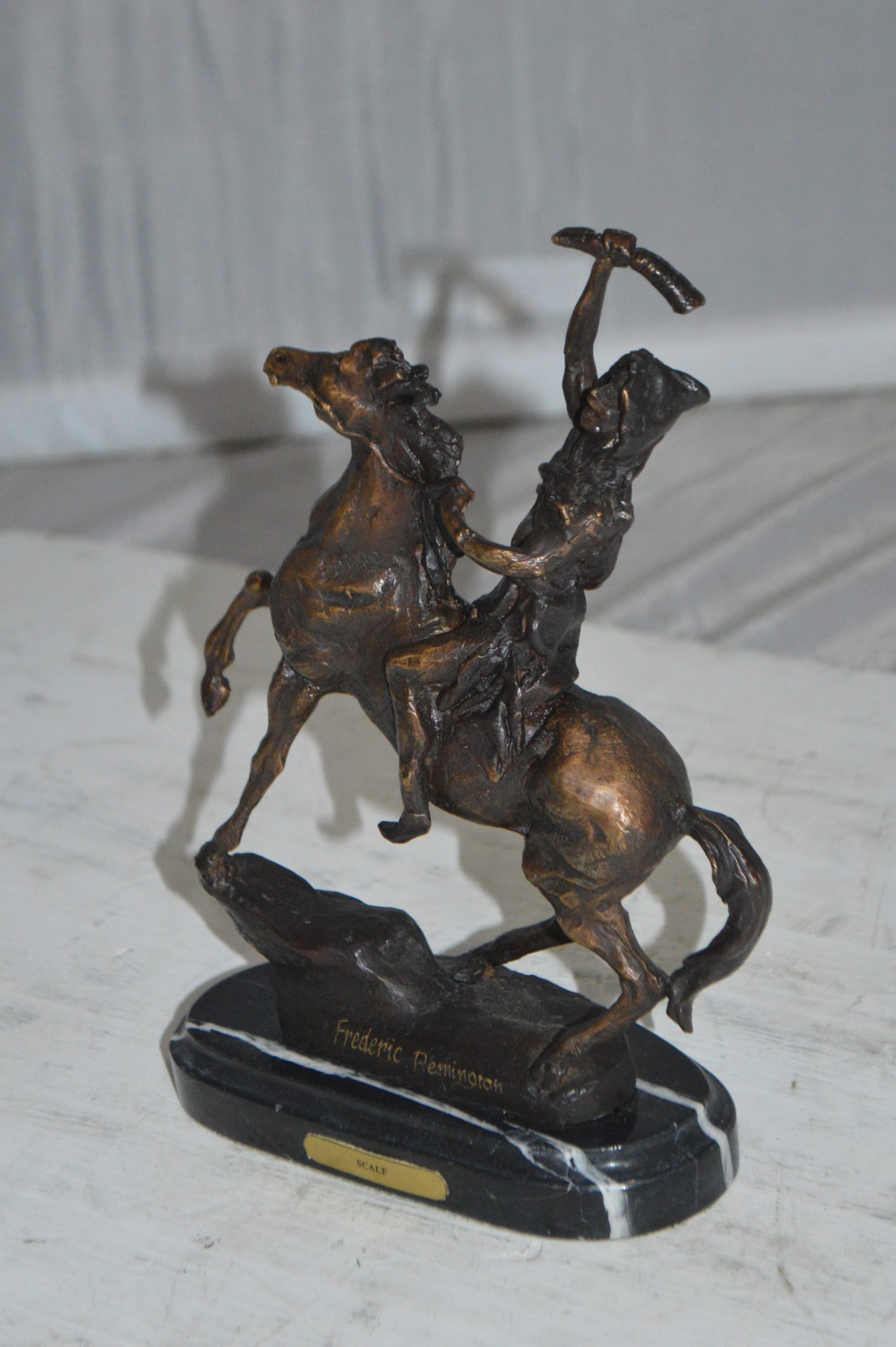 Scalp By Remington Bronze Statue -  Size: 3"L x 7"W x 10"H. 