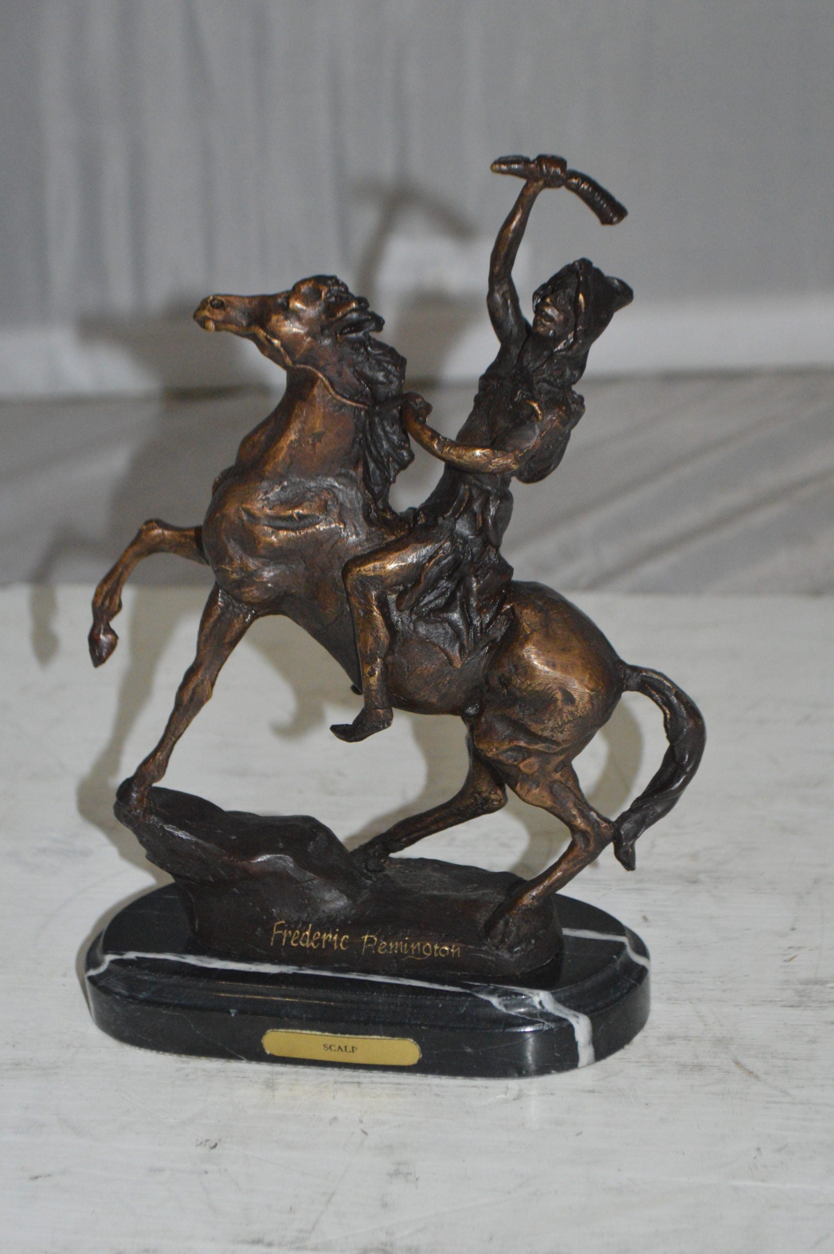 Scalp By Remington Bronze Statue -  Size: 3"L x 7"W x 10"H. 