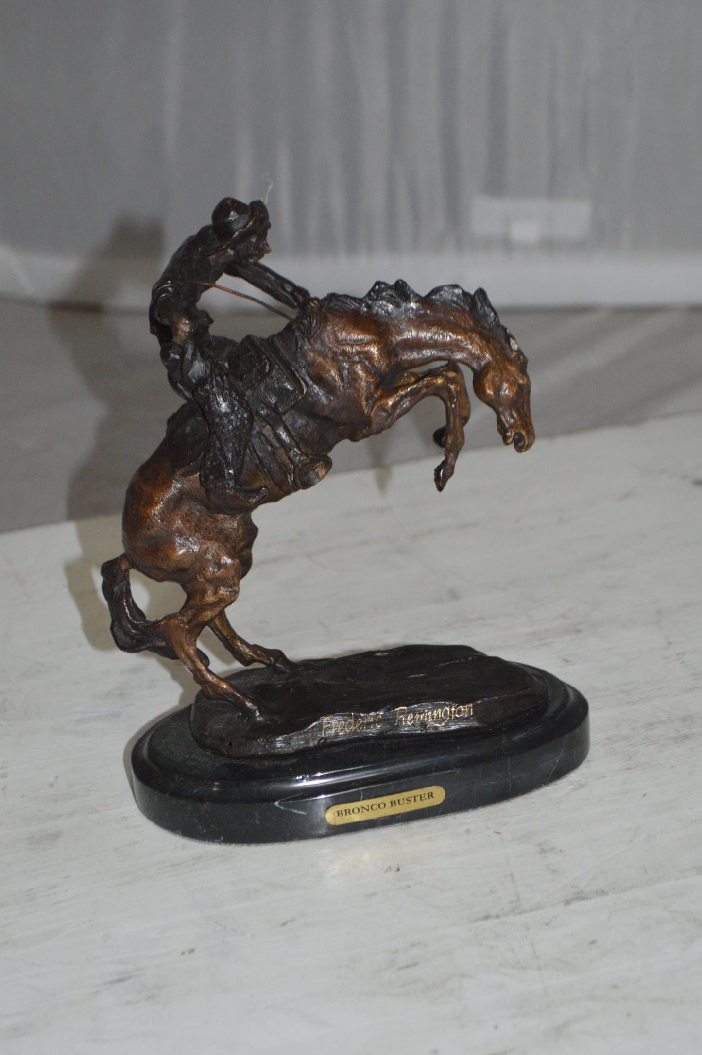 Bronco Buster by Remington Bronze Statue -  3" x 7" x 10"H. 