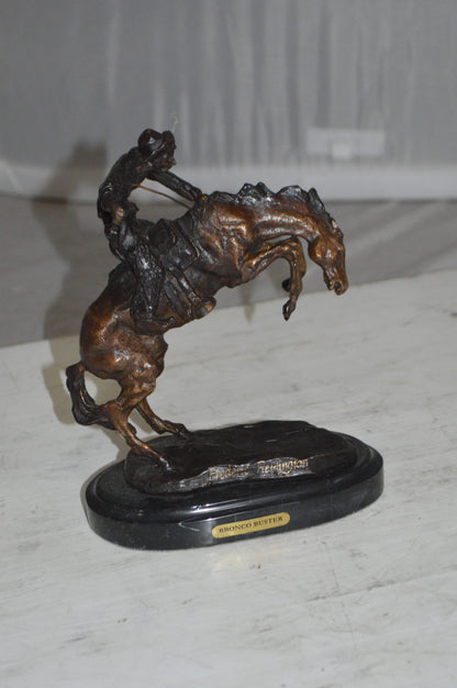 Bronco Buster by Remington Bronze Statue -  3" x 7" x 10"H. 