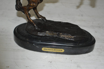 Bronco Buster by Remington Bronze Statue -  3" x 7" x 10"H. 