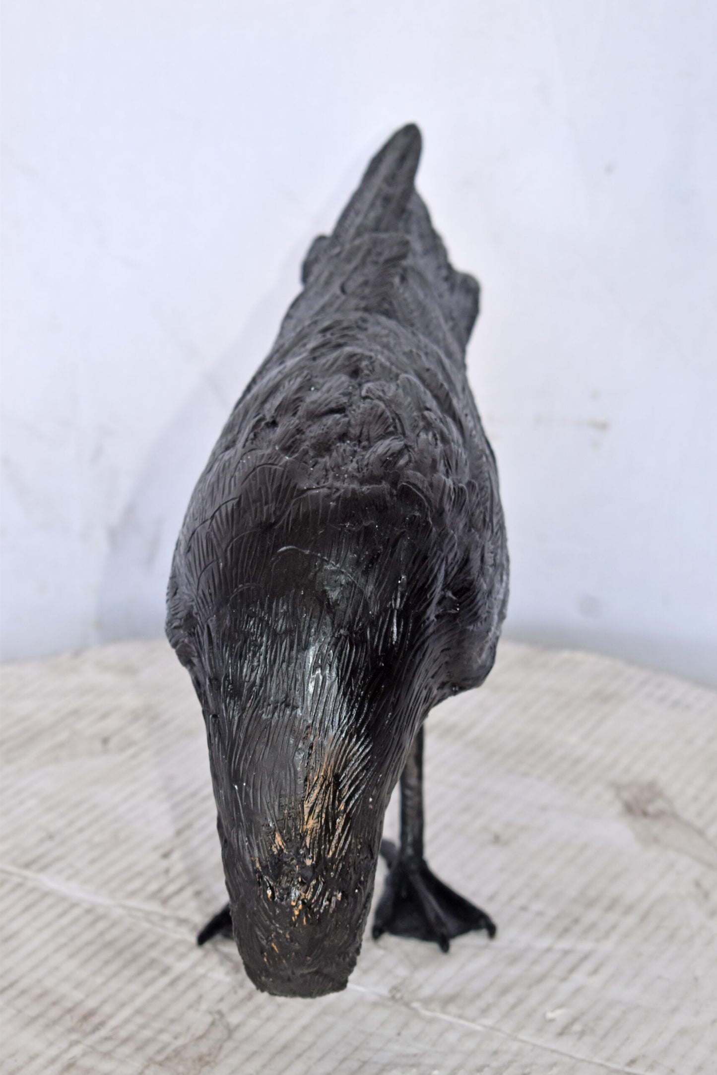 Raven Looking Down Bronze State - Size: 19"L x 5"W x 11"H.