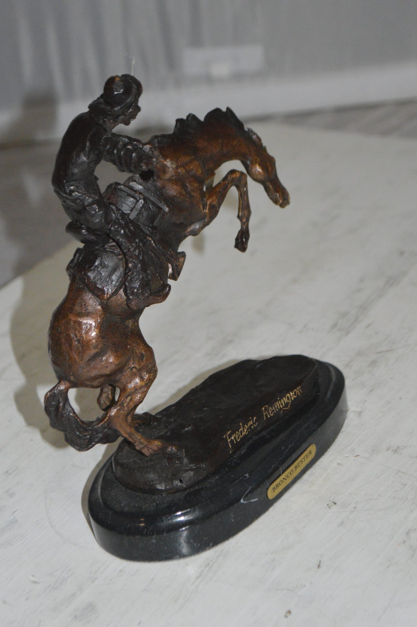 Bronco Buster by Remington Bronze Statue -  3" x 7" x 10"H. 