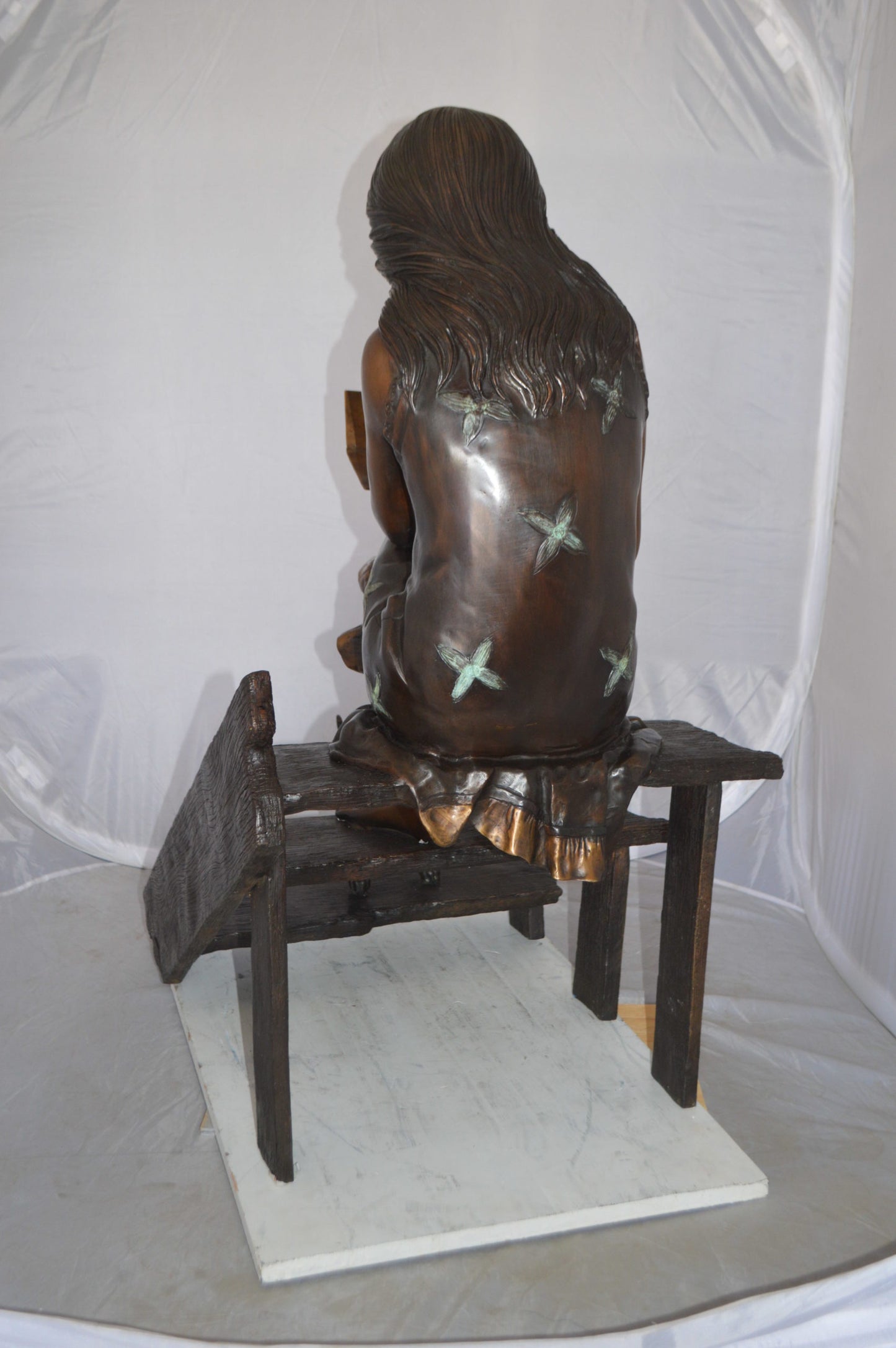 Girl Reading Letters on the Stairs Bronze Statue -  Size: 32"L x 22"W x 40"H. 