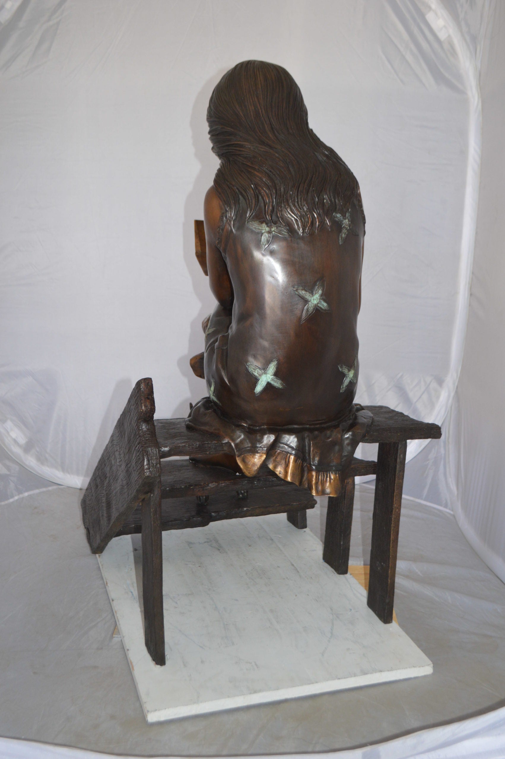Girl Reading Letters on the Stairs Bronze Statue -  Size: 32"L x 22"W x 40"H. 