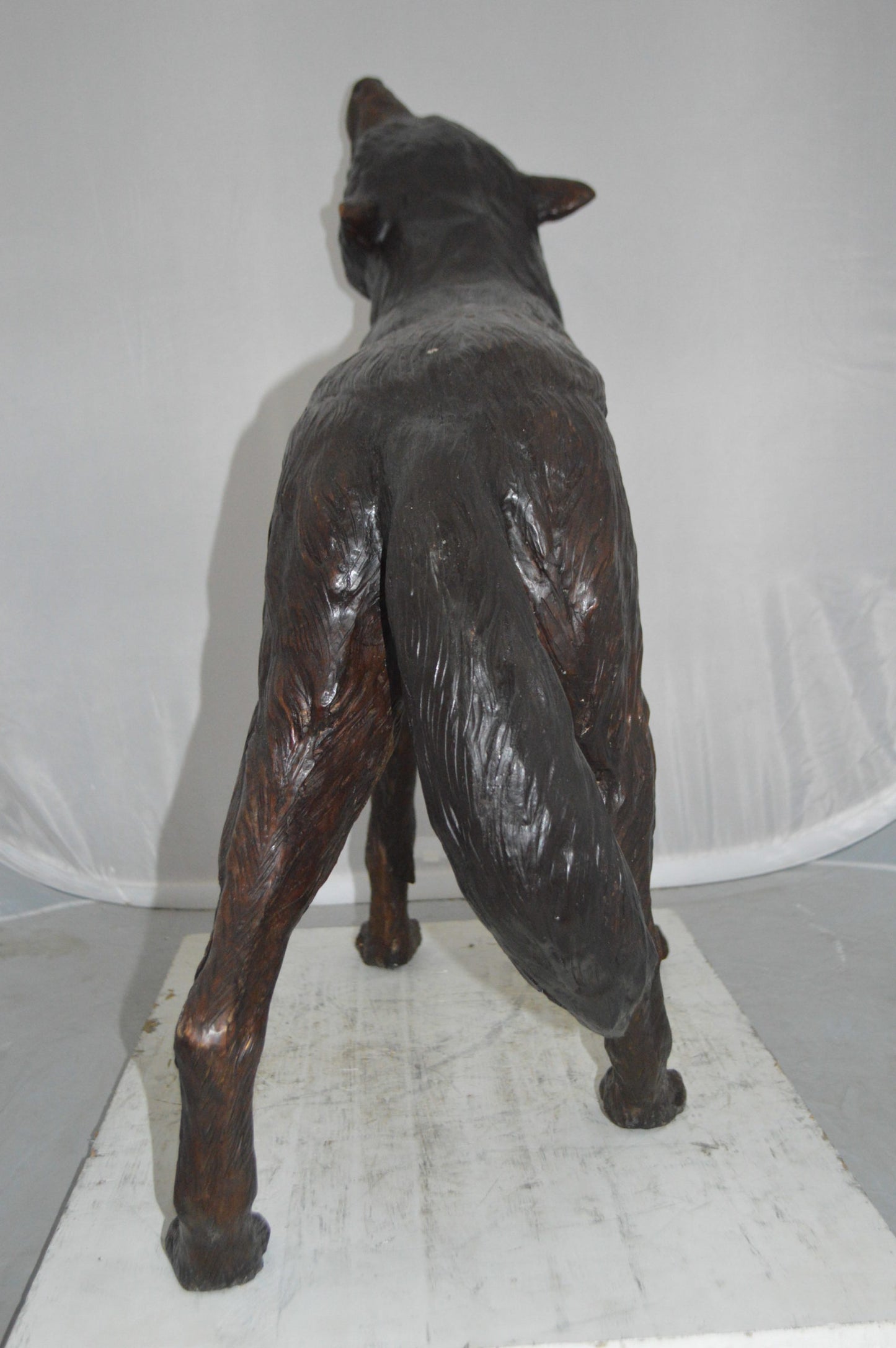 Howling Wolf Bronze Statue -  Size: 40"L x 10"W x 32"H.