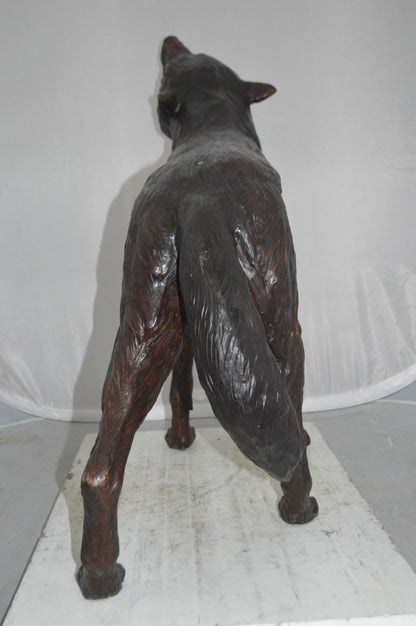 Howling Wolf Bronze Statue -  Size: 40"L x 10"W x 32"H.