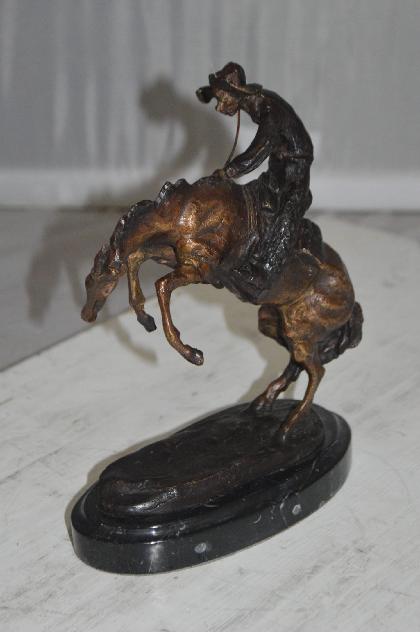 Bronco Buster by Remington Bronze Statue -  3" x 7" x 10"H. 