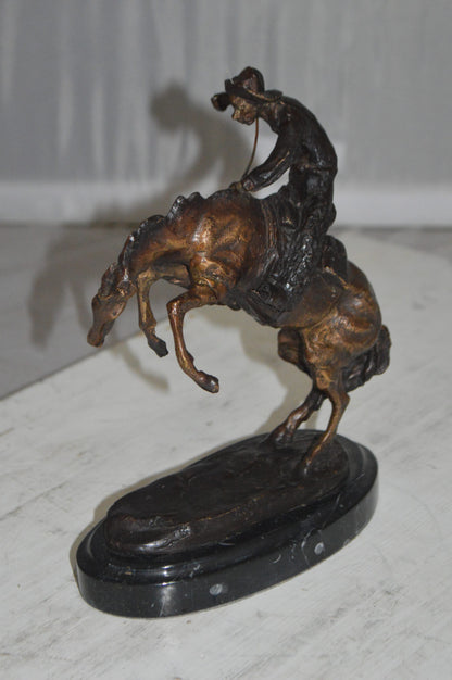 Bronco Buster by Remington Bronze Statue -  3" x 7" x 10"H. 