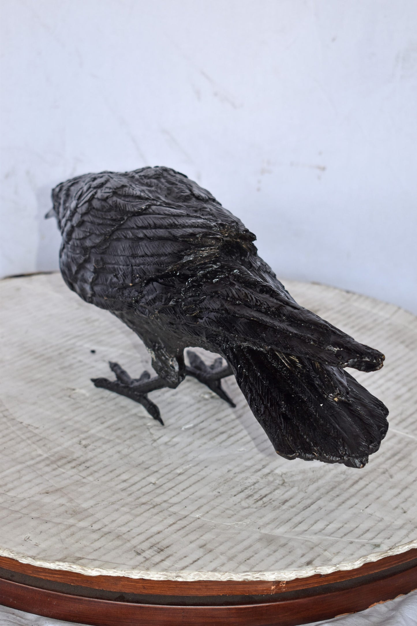 Raven Looking for Food Bronze State - Size: 24"L x 6"W x 12"H.