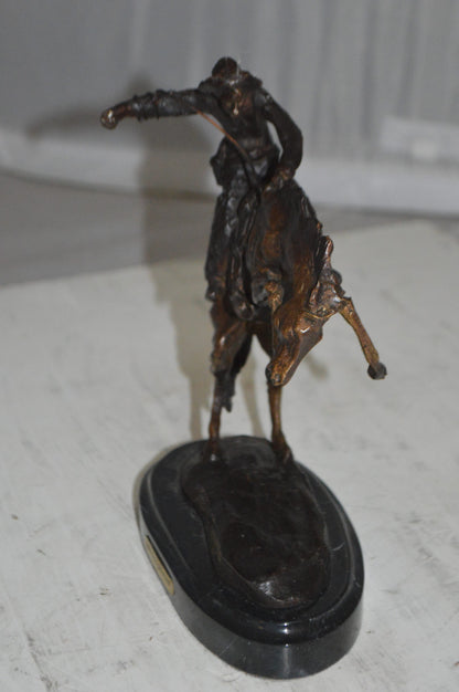 Bronco Buster by Remington Bronze Statue -  3" x 7" x 10"H. 