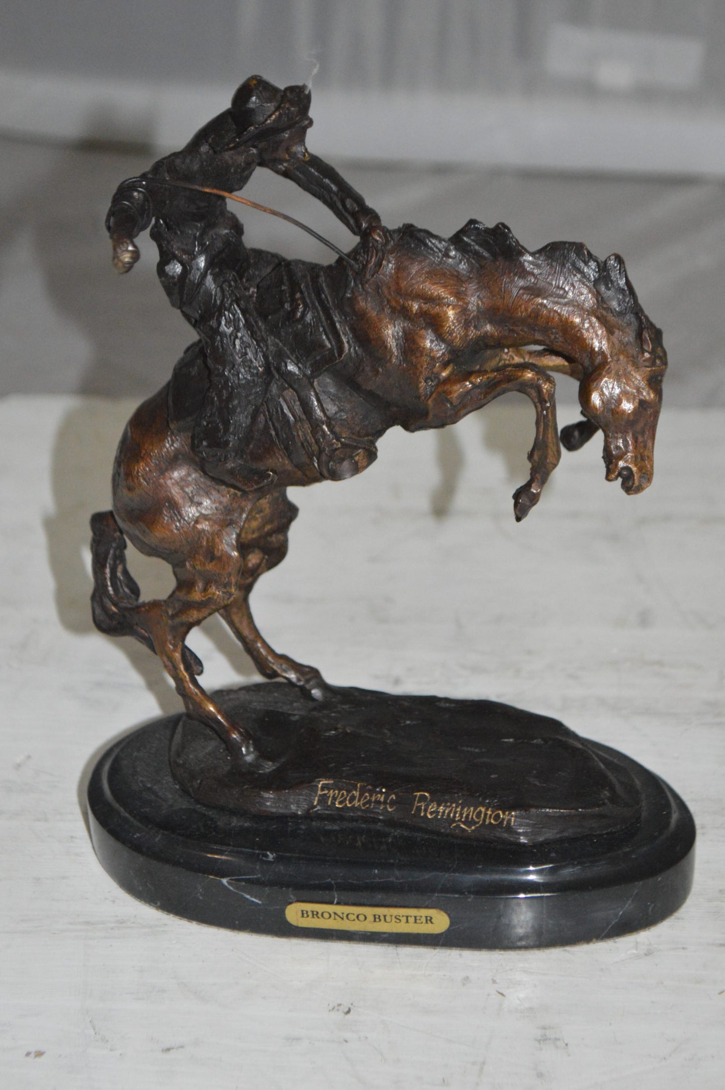 Bronco Buster by Remington Bronze Statue -  3" x 7" x 10"H. 