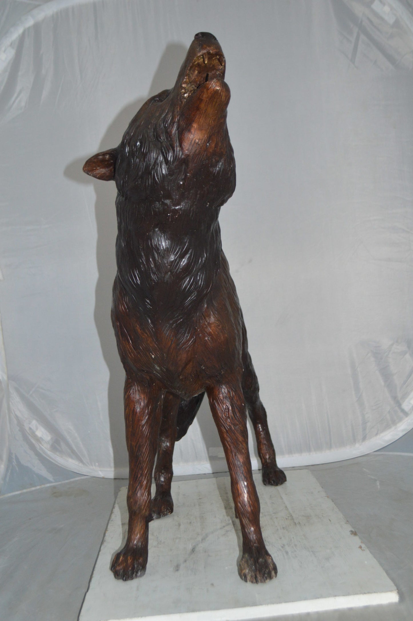 Howling Wolf Bronze Statue -  Size: 40"L x 10"W x 32"H.