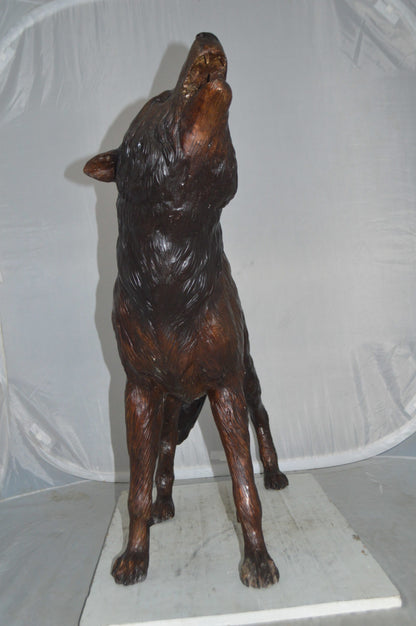 Howling Wolf Bronze Statue -  Size: 40"L x 10"W x 32"H.