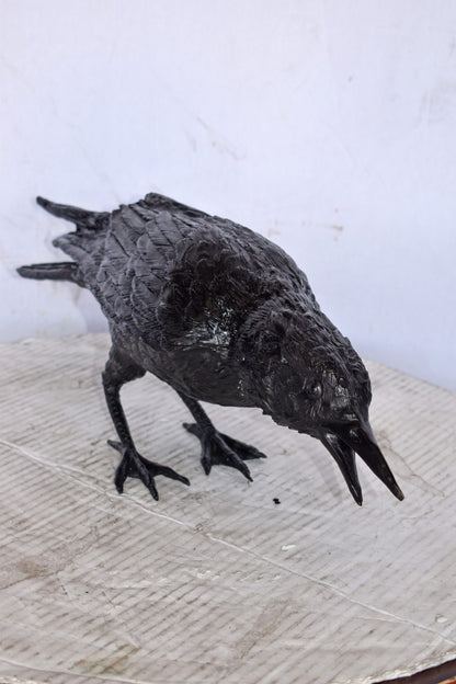 Raven Looking for Food Bronze State - Size: 24"L x 6"W x 12"H.