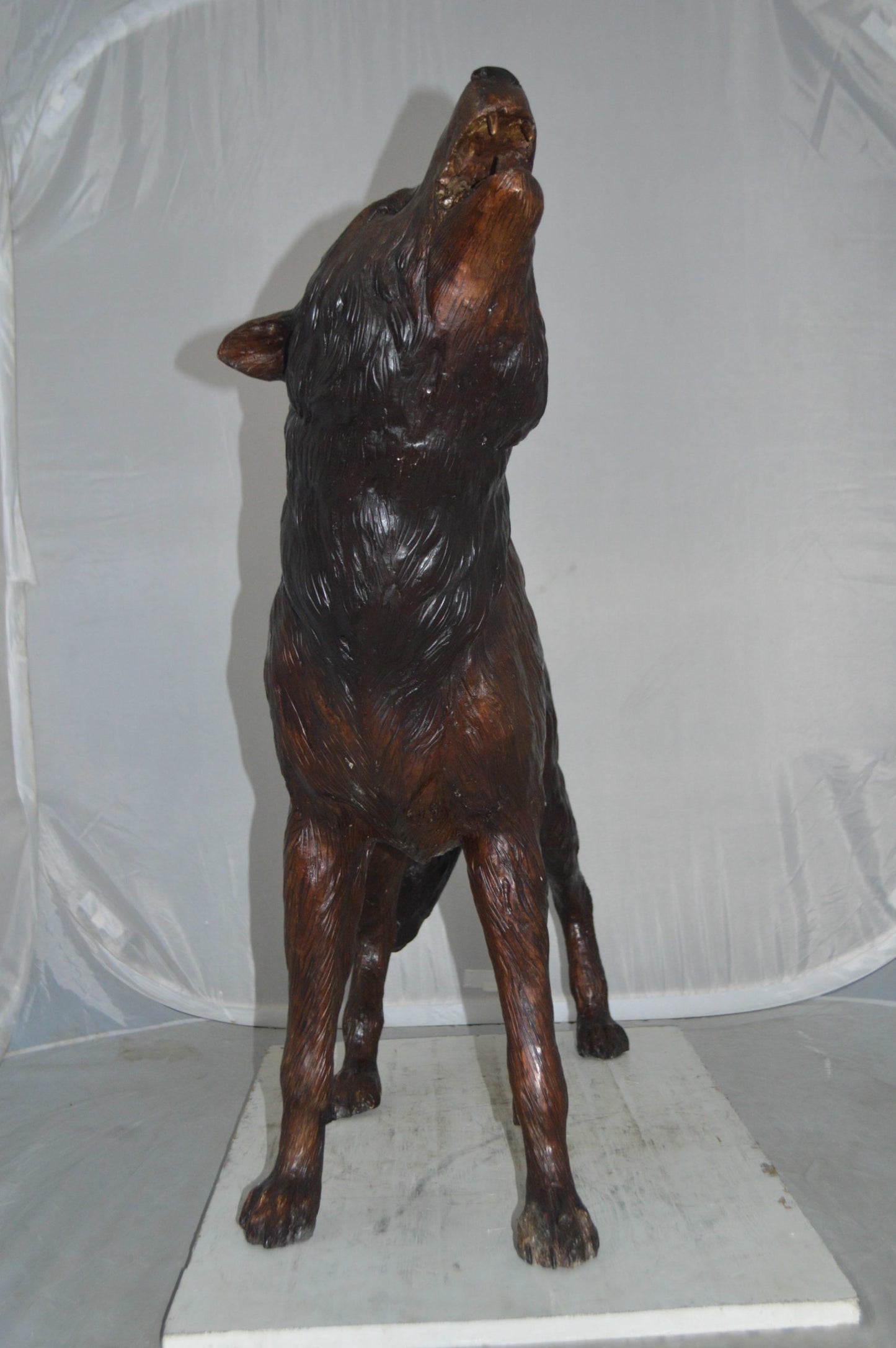 Howling Wolf Bronze Statue -  Size: 40"L x 10"W x 32"H.